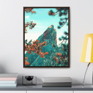 wall art of an image of a mountain peak in between two trees