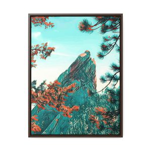 wall art of an image of a mountain peak in between two trees