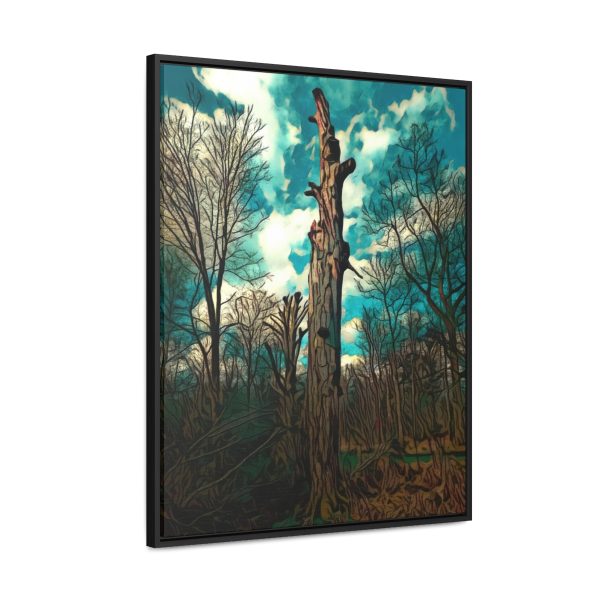 an image in a frame on wall of a single tree in the midst of other trees in the background and cloudy skies. the image has been enhanced for an excellent feel and finish